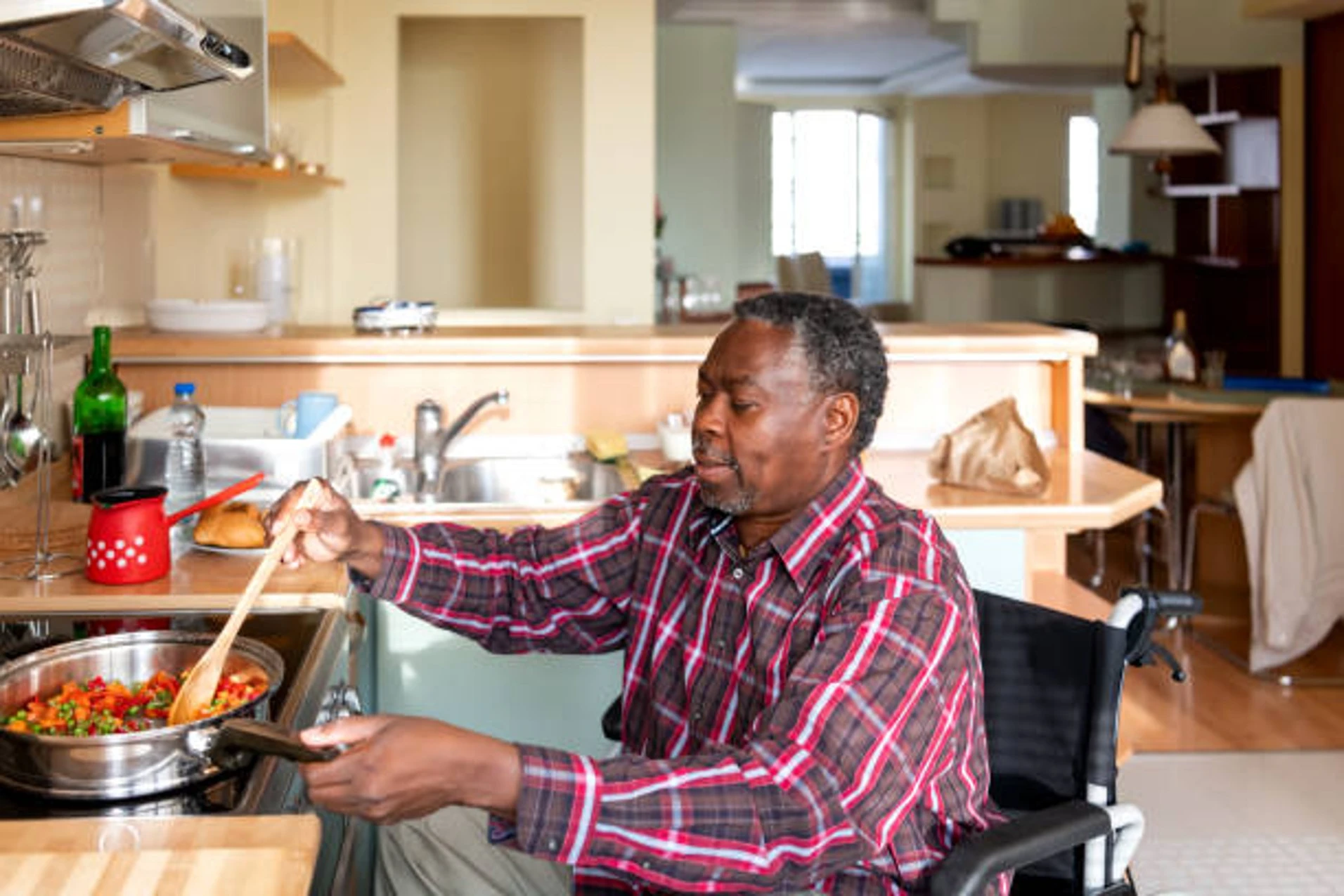 Man in Chair Cooking